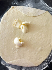 Mit Butter bestreichen